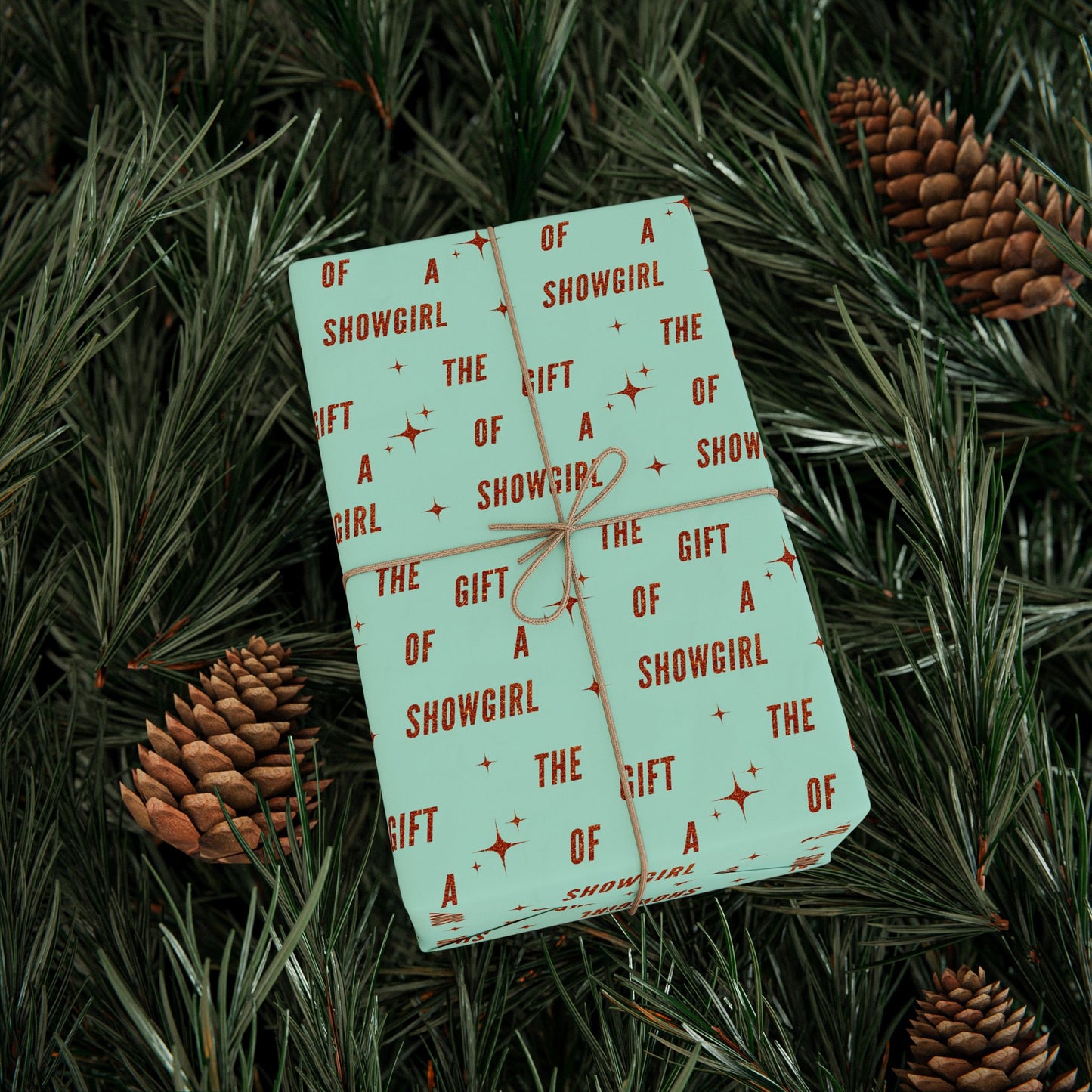 The Gift of a Showgirl matte wrapping paper roll, present mockup 2, by Merry May