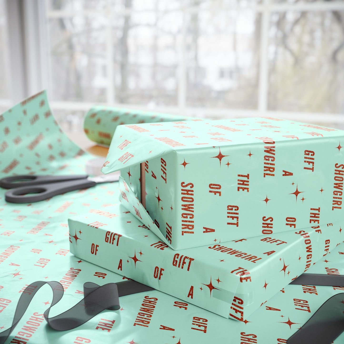 The Gift of a Showgirl matte wrapping paper roll, side present view, by Merry May