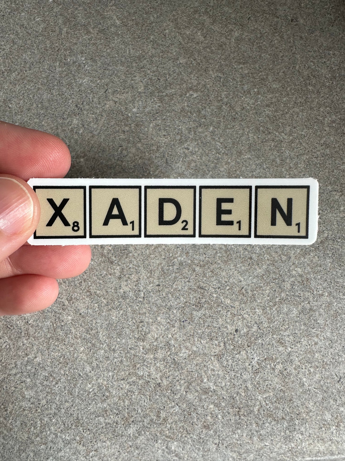 Xaden Game Tiles Vinyl Sticker, 3.0” x 0.68” - Merry May