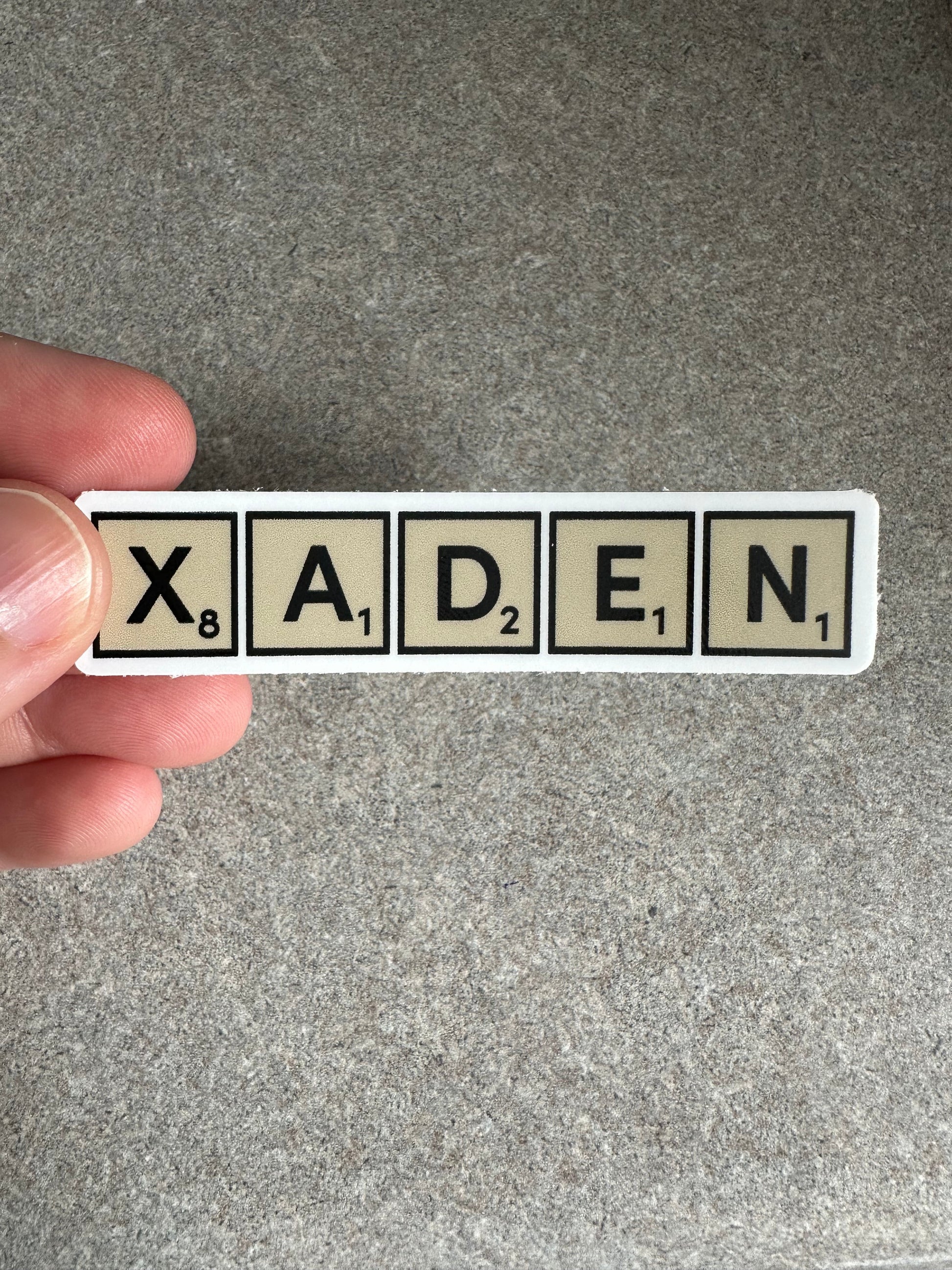 Xaden Game Tiles Vinyl Sticker, 3.0” x 0.68” - Merry May