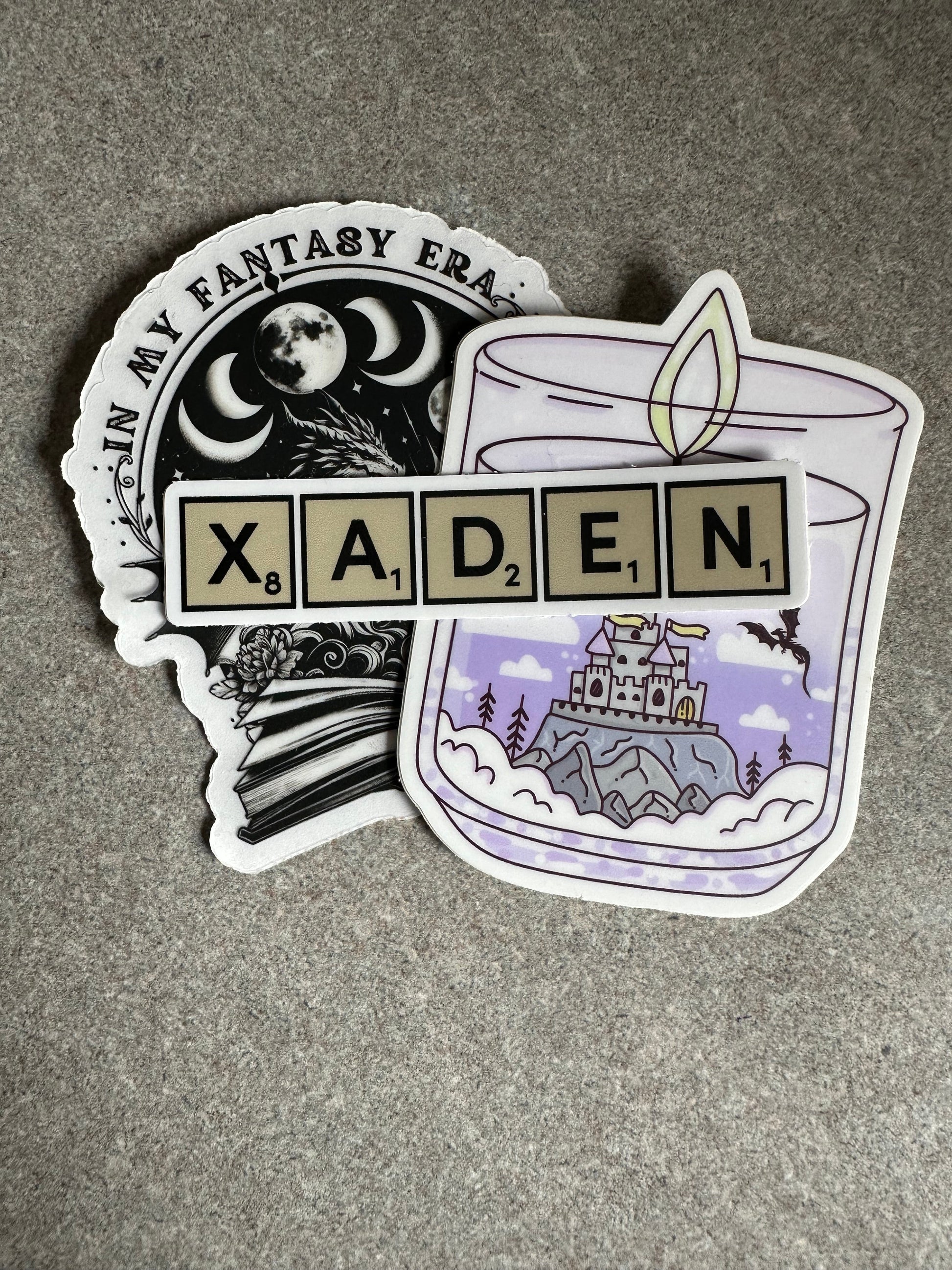 Xaden Game Tiles Vinyl Sticker, 3.0” x 0.68” - Merry May